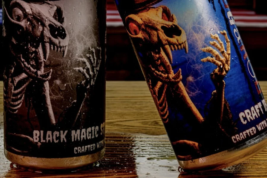 Henry’s own Rougarou and Black Magic cans